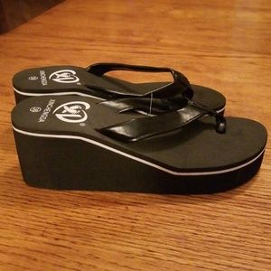 Black wedge flip flops